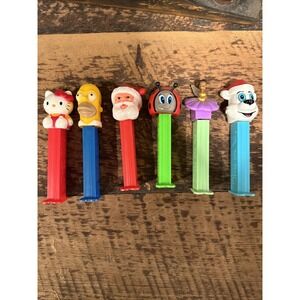 6 VINTAGE PEZ DISPENSERS Hello kitty, Homer Simpson, Santa, Etc